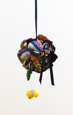 bundle of cloth hanging from the ceiling