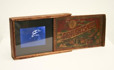 small antique box containing a recording