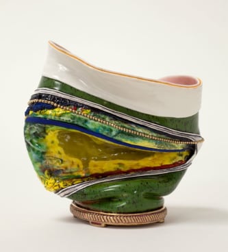 Organically-shpaed, multicolor clay bowl with gold accents by Kathy Butterly.
