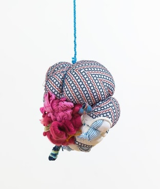 bundle of cloth hanging from the ceiling