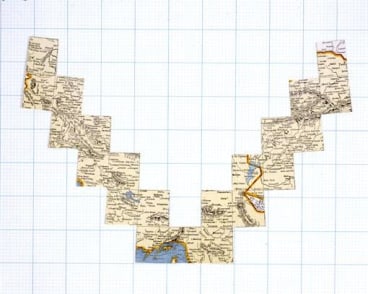maps pasted on a giant grid in the shape of a giant V