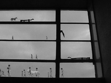 miniature people and animals walking on top of window rails