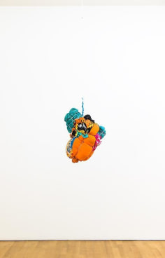 bundle of cloth hanging from the ceiling