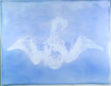 silhouette of a swan over a light blue background