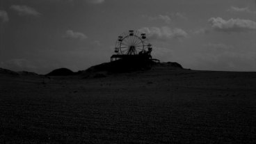 silhouette of a carousel