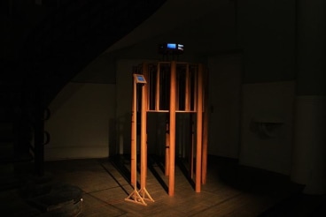 orange contraption in the dark