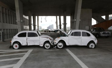 &#039;Art History with Passion&#039;, by The Bruce High Quality Foundation, 2013, comprises two Volkswagen Beetles set at each other&#039;s throats. The familiar forms are anthropomorphised into a bio-mechanical brawl