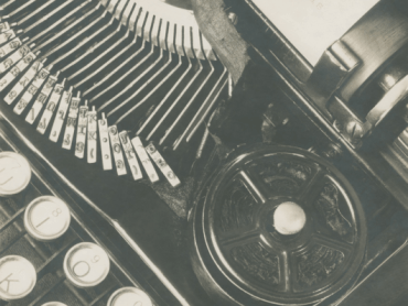 A typewriter photographed in black and white
