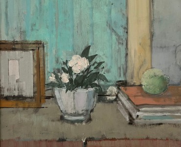 table top still life with white flowers, an apple and books