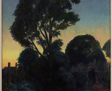dark street in santa fe with faint figures on a bridge