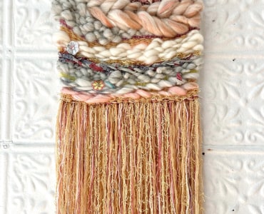 Weaving from textured fabrics in creme, brown and pink
