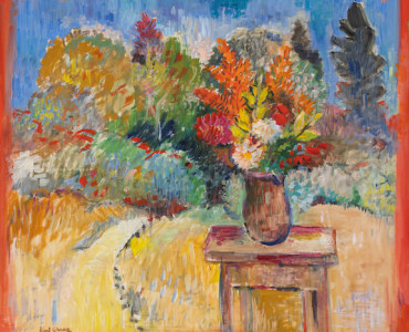 bouquet of flowers on a table in a field