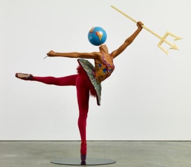 mannequin with a globe for a head dancing ballet