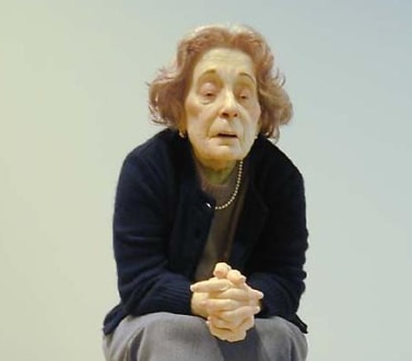 image of a seated older woman