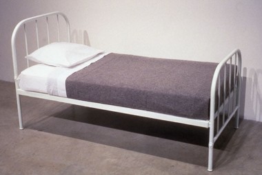 The bed Ethel Rosenberg slept in the night before her execution, 1953-1998. Painted steel bed frame, mattress, pillow, pillowcase, blanket, sheets, 30 1/2 x 54 1/2 x 27 inches. MP 60