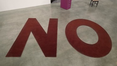 Untitled, 2011. Two Brown letter floor rugs, letter N - 107 1/2 x 71 inches / 273.1 x 180.3 cm; letter O - 107 1/2 x 83 1/2 inches / 273.1 x 212.1 cm; NO - 107 1/2 x 169 3/4 inches / 273.1 x 431.2 cm.