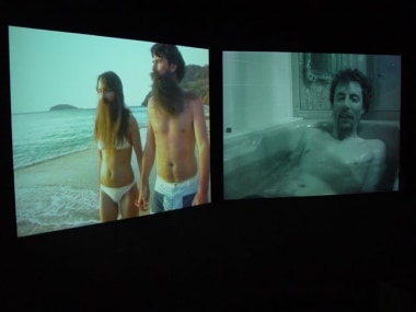 Installation view from &quot;Home,&quot; 2003. Dual screen DVD shot with digital camera, 32 minutes. Edition of 5. MP V-7
