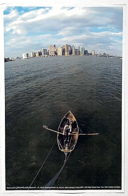 Photo of woman rowing across river in NYC