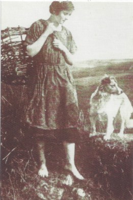 Still image of farming woman with sheep dog