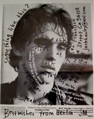 Image of man, with sharpie marks and writing over photo
