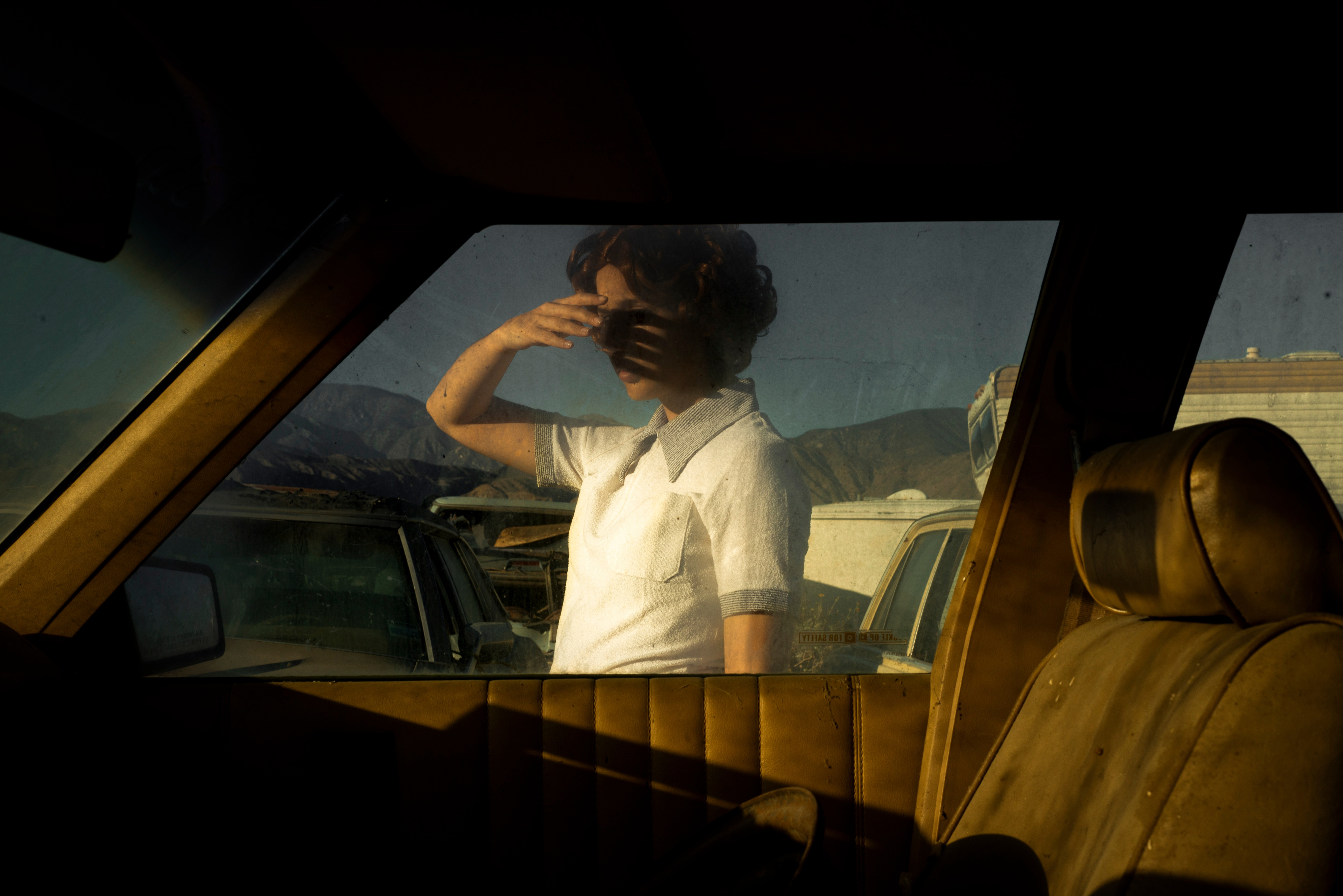 Tania Franco Klein, Car, Window (Self-portrait), 2018, from the series Proceed To The Route. Archival pigment print.