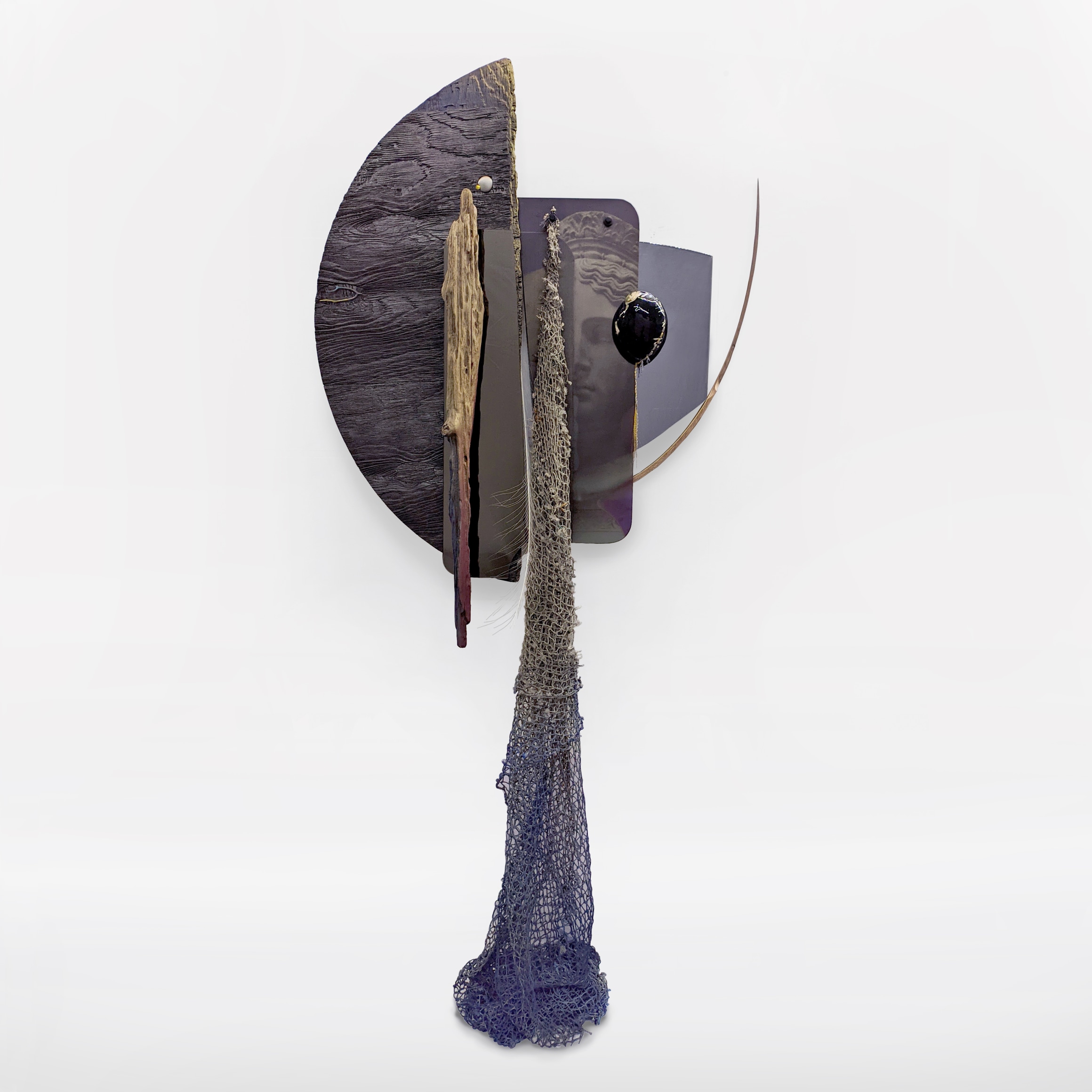 Omar Barquet, 3rd Alchemist (for M. Pstoletto), 2022. Digital print on enameled glass, fragments of enameled sandblasted wood, rocking chair, tree branch and coral branch, smoked and regular mirrors, nacre shell, oyster, enameled fishing net, silver and golden pins, albino peacock feather, 86 5/8 x 40 1/2 x 15 3/4 inches