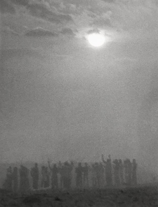 Chester Higgins -  Sunrise prayer on Osu Beach, Accra, Ghana, 1973