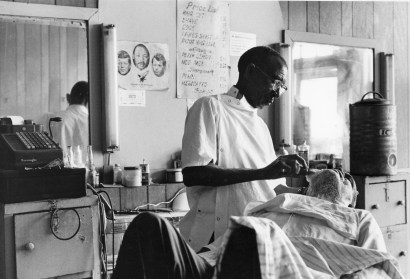 Chester Higgins -  Barbershop, Tuskegee, Alabama, 1972  | Bruce Silverstein Gallery