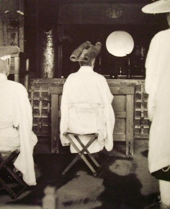 Werner Bischof - Pilgrim before the Altar of Kyomizu Temple, Japan, 1951 Gelatin silver exhibition print mounted to masonite | Bruce Silverstein Gallery