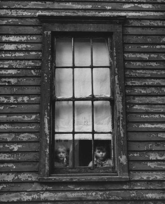 Marvin E. Newman -  Untitled (Girl and Boy in Window), 1951  | Bruce Silverstein Gallery