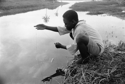 Chester Higgins -  Basin fishing, Accra, Ghana, 1973