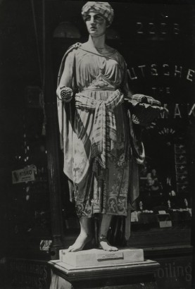 E. O. Hopp&eacute; -  Wooden Figure Outside Tobacco Shop, New York City, 1926  | Bruce Silverstein Gallery