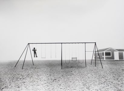 Larry Silver - Boy Standing on Swing, Compo Beach, Westport, CT, 1975 | Bruce Silverstein Gallery