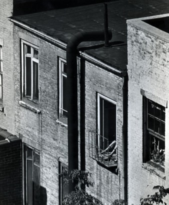 Andr&eacute; Kert&eacute;sz - Woman on Fire Escape, 1962  | Bruce Silverstein Gallery