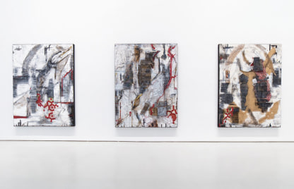 installation view of three large abstract paintings collaged with textiles