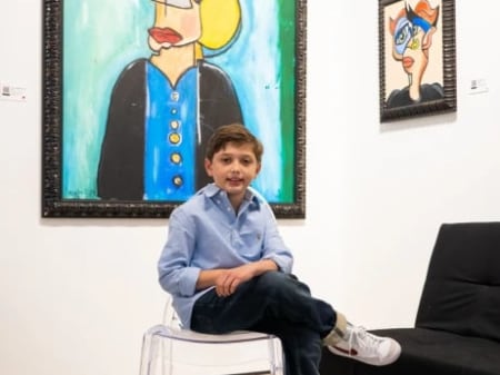 10-year-old art prodigy shows off his work