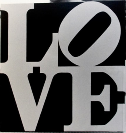 LOVE is a 24 inch square painting with the white letters L and a tilted O stacked above the letters V and E, against a black background.