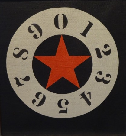 A painting with a circle on a black background. In the middle of the circle is a red star. The star is surrounded by a white ring containing the black numerals going clockwise from zero at the top though nine.