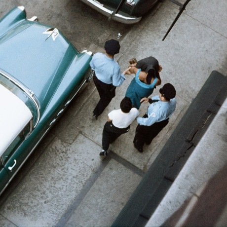 Police raids and urban crime of the 1950s revealed in incredible photos taken by Life magazine's first black photographer Gordon Parks