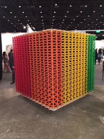 Black Cube Holding Together All the Colors of Rainbow
