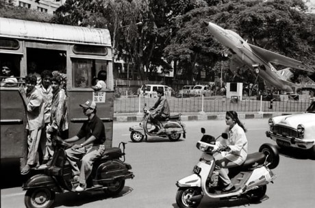 Raghu Rai Fighter Plane in City Traffic, Bangalore 