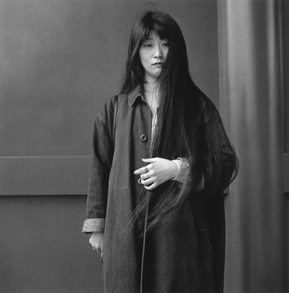 A Clerk Who Was Letting Her Hair Grow Long, 1987. Gelatin Silver Print. 14 x 14 inches, Edition of 20