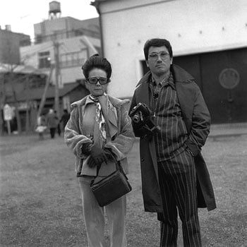 A couple with vintage camera, 1974,  Gelatin Silver Print, image 14 x 14&quot; / paper 16 x 20&quot;, Signed, titled, editioned and dated in pencil on verso, Edition of 20 