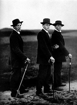 August Sander, Three young farmers, Westerwald, 1914, image 10.5 x 7 inches/mount 17.25 x 13.25 inches, Gelatin Silver Print, Signed on verso by Gerd Sander, estate stamp also on verso, Edition 9/12, Illustrated: August Sander - Citizens of the Twentieth Century, pg. 17