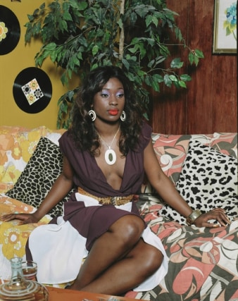 Mickalene Thomas,&nbsp;Portrait of Qusuquzah, 2008. Chromogenic print, image: 70 1/4 x 56 1/4 inches, paper: 74 3/4 x 60 3/4 inches. Also available as image: 29 1/2 x 23 3/4 inches, paper: 33 1/4 x 27 1/2 inches.