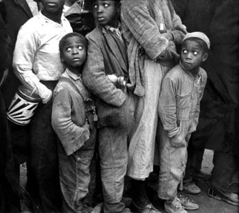 Walker Evans, Waiting in Line-Flood Refugees, Arkansas, 1937, 9 x 11 inch Vintage silver print, Farm Security Administration stamp on verso. Inscribed &quot;F.S.A. photo by Walker Evans&quot; on verso