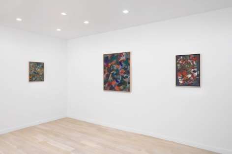 installation view of three abstract paintings