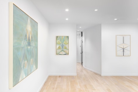 installation view of geometric abstract paintings