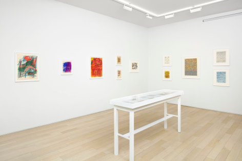 installation view with framed drawings