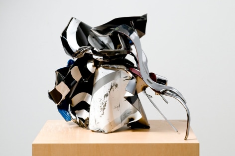 a sculpture made of bent steel